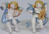 Figurines x2 - E. Boria - Pair of cherubs, Majolica glaze terracotta, Signed to rear, H 20cm