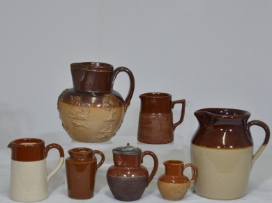 Pottery - A selection of pottery and stoneware Jugs including an unmarked Hunting scene