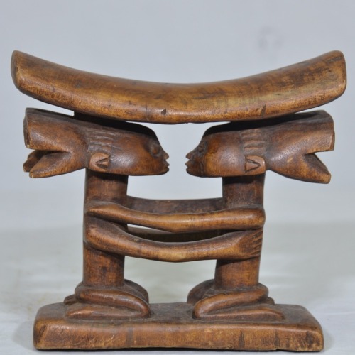 Tribal - African Head Rest, Carved timber decorated with two facing figurines, 19 x 18cm.