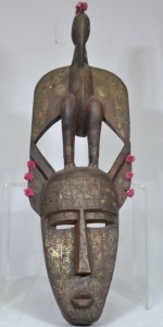 Tribal Artifact - Mask with spirit bird to top, Painted timber, 76 x 25cm.