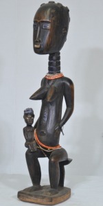 Tribal - Ethiopian Madonna with Child, Carved timber with decorative beads, H 47cm.