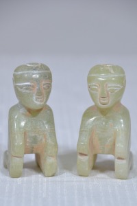 Asian - Neolithic style, carved ethnic figurines in stone. H 7cm.