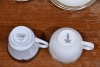 Fine China x 2 - 1 x 8 Royal Doulton cups and saucers and 1 x 2 Noritake trio (cup, saucer and plate) - 2