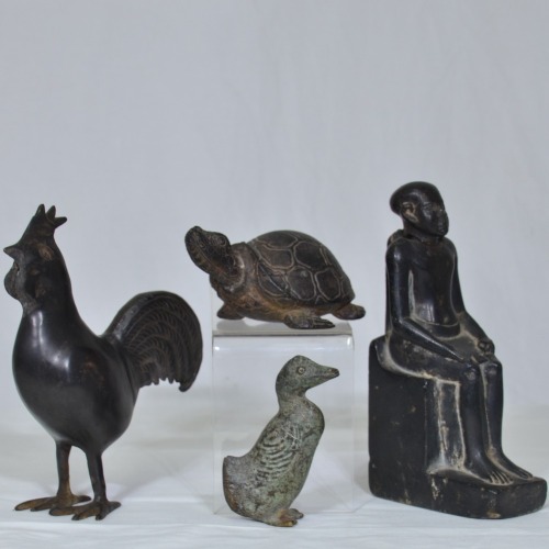 Figurines x 4 - 1 x Stone Egyptian seated figure (repaired), 1 x Metal turtle, 1 x Metal bird, 1 x Metal cockerel