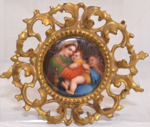 Religious Artifact - Religious scene on circular ceramic disc with elaborate plaster frame, Repair to disk, D 8cm.