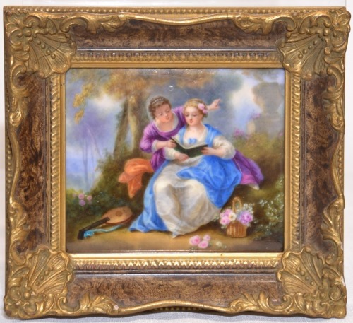 Art - Two European girls reading, Hand painted enamel plaque in decorative frame, 21 x 19cm.