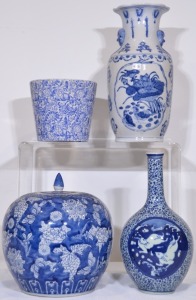 Pottery - A selection of blue and white decorator pots with Asian themes.