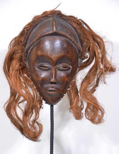 Tribal - African carved mask with hair. 24 cm.