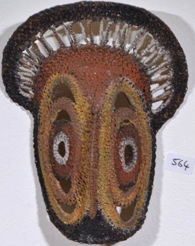 Tribal - Small Papua New Guinea yam mask made from woven textile and painted.