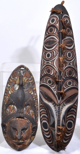 Tribal x 2 - Papua New Guinea masks. 60 cm.