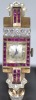 Jewellery - Gold ladies dress watch with rubies and diamonds. 1 Stone missing. Test as 9 K gold, 28grams without movement. Watch working as found.