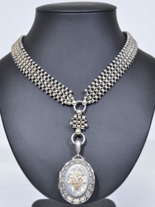 Jewellery - Silver hallmarked locket with silver mesh chain. 61grams.