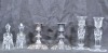 Antiques x 6 - Mixed lot. 2 x Forged candle sticks. 13cm. 2 x Cut glass candle sticks. 16cm. 2 x Crystal bells. 12cm.