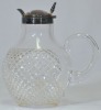 Antiques - Cut glass claret jug with a silver fitted lid. 18cm.
