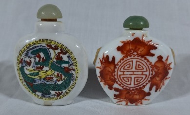 Asian Artifact x 2 - Snuff Bottles. 1 x White porcelain hand-painted dragon 7cm. 1 x White porcelain with painted red flowers H 6cm.