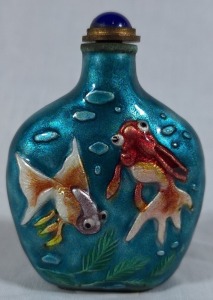 Asian Artefact - Snuff Bottle. Boldly enamelled featuring fish, stopper with metal spoon and what appears to be a gemstone. Exquisite. H 7cm.