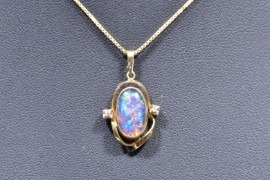 Jewellery - Opal doublet pendant with diamond to either side & marked 9kt gold chain & mount.