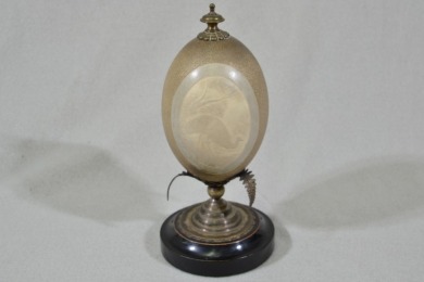 Australiana - Carved Emu egg on silver plated mounting.