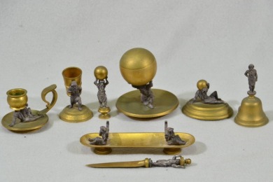 Desk Set (8) - Monogramed items featuring the god Atlas. Items include, Inkwell, bell, candle holder, seal, paper weight, letter opener, pen rest, Pouce holder.