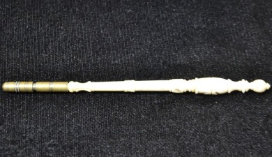 Crouchet Tambour - with self in casing handle. Beautifully carved bone with brass tip.