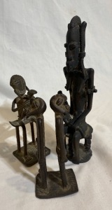 Religious Artifact x3 - African cast metal, Mother with Child, H 11cm. African cast metal, Male and Female figurines, H 10cm. African cast metal, Fertility statue, Mother with Child, Crude and heavy, H 17cm.