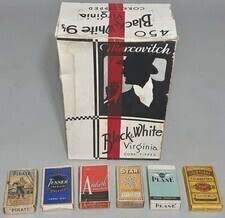 Empty cigarettee packets x6 and a large cigarette display box