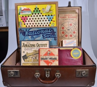 Vintage suitcase full of early Board Games